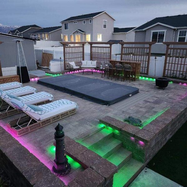 Permanent lighting systems can be added to other outdoor areas such as walls and fences to add a touch of color and light in backyards, pool areas, and patios.