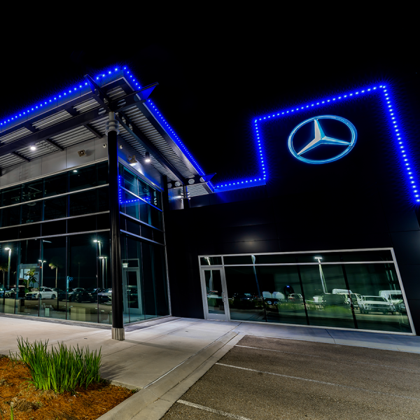 Mercedes Dealership with Lights on it